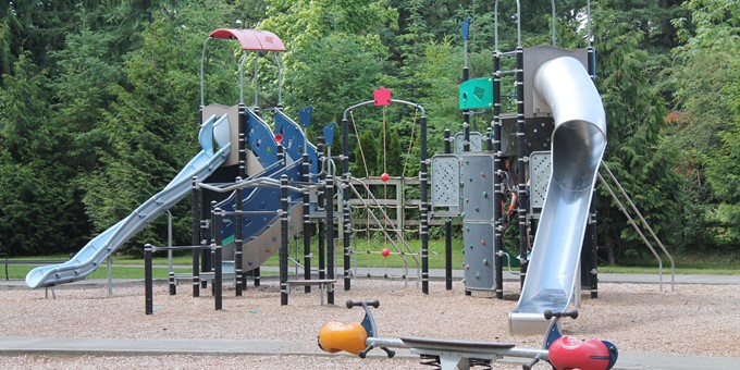 ebright creek park playground, including slides and small climbing wall